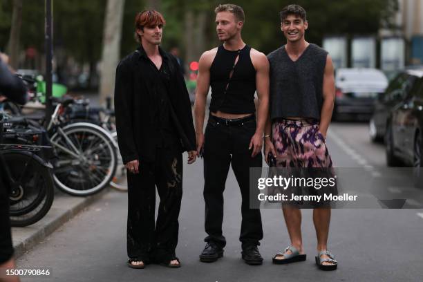 Matthias Geerst is seen wearing mesh black top and matching mesh black pants, black flanell shirt and Dior x Birkenstock sandals and Ruben van de...