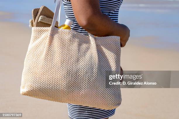 young woman ready for the beach - tote bag stock pictures, royalty-free photos & images