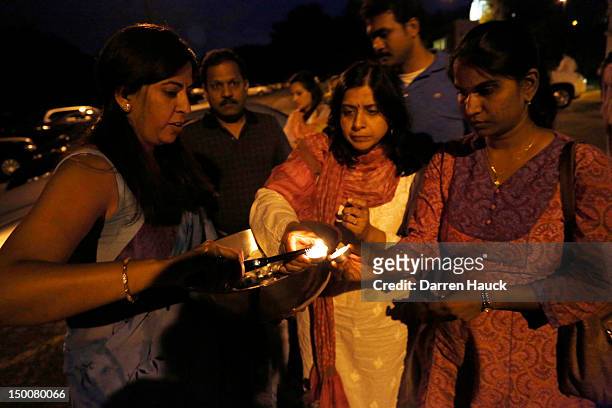 The Hindu Temple of Wisconsin holds a vigil for the Sikh community along with mourners on August, 9 2012 in Pewaukee, Wisconsin. Suspected gunman,...