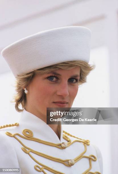 Princess Diana attends a passing out parade at Sandhurst, on April 10 she is wearing a military style suit by Catherine Walker and hat by Graham...