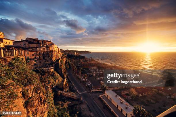 beautiful sunset in the charming town of tropea - calabria stock pictures, royalty-free photos & images