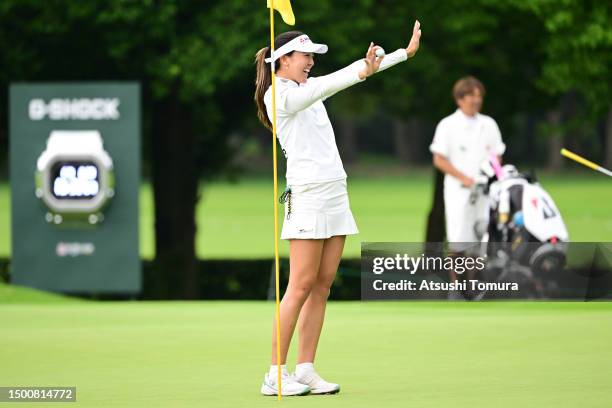 Eimi Koga of Japan celebrates after the hole-in-one on the 9th green during the second round of Earth Mondahmin Cup at Camellia Hills Country Club on...