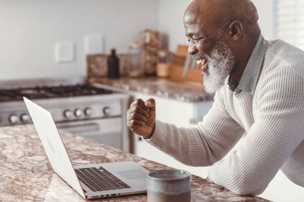 handsome man just won a bet - win bets africa stock pictures, royalty-free photos & images