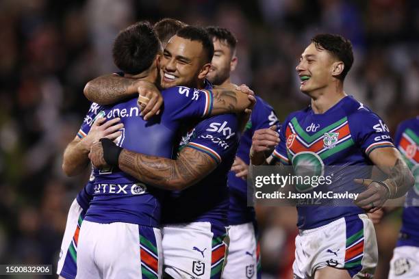 Addin Fonua-Blake of the Warriors celebrates with try-scorer Shaun Johnson of the Warriors during the round 17 NRL match between St George Illawarra...