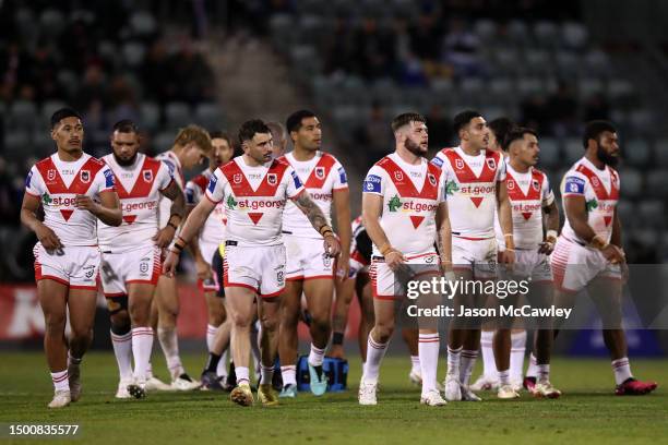 Dragons players look on after a try during the round 17 NRL match between St George Illawarra Dragons and New Zealand Warriors at WIN Stadium on June...