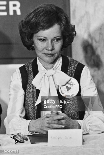 American US First Lady Rosalynn Carter, wearing a badge that reads 'I Helped Save The Village Nursing Home', at the Village Nursing Home in the...