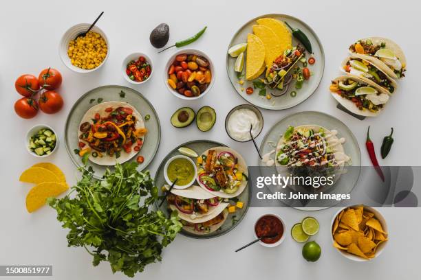 healthy feast with various mexican food - mexican food stock pictures, royalty-free photos & images