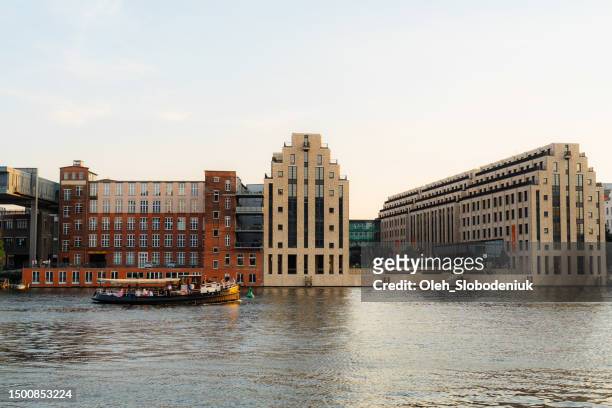 nautical vessel on spree river in berlin - east berlin stock pictures, royalty-free photos & images