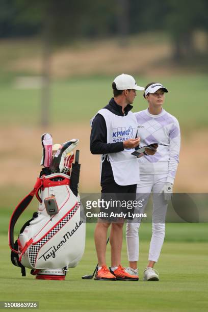 Esther Henseleit of Germany and her caddie line up a shot from the 17th fairway during the second round of the KPMG Women's PGA Championship at...