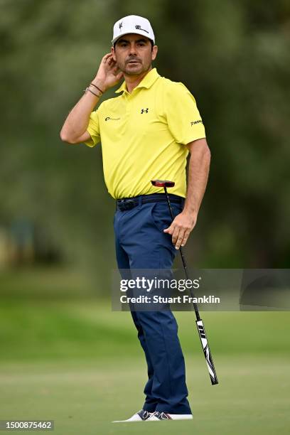 Felipe Aguilar of Chile prepares to play his putt shot on the 10th hole during Day Two of the BMW International Open at Golfclub Munchen Eichenried...