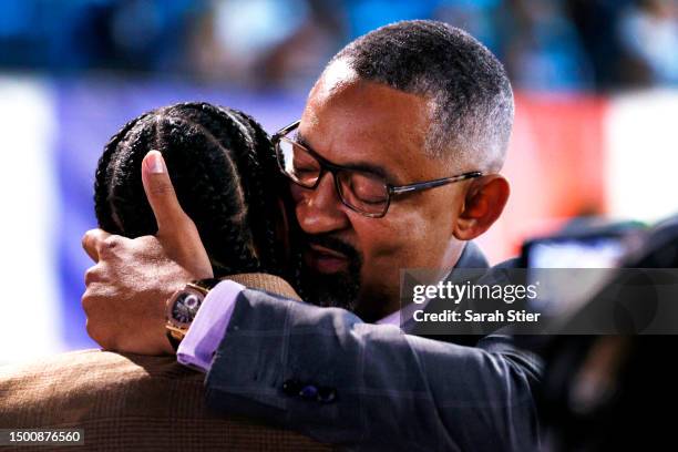 Father Juwan Howard hugs his son Jett Howard after being drafted 11th overall pick by the Orlando Magic during the first round of the 2023 NBA Draft...