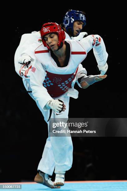 Steven Lopez of The United States of America competes against Ramin Azizov of Azerbaijan during the Men's -80kg Taekwondo Preliminary Round on Day 14...