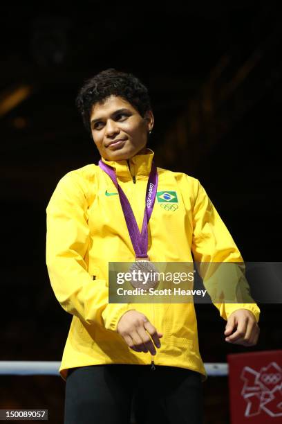 Bronze medalist Adriana Araujo of Brazil celebrates during the medal ceremony for the Women's Light Boxing final bout on Day 13 of the London 2012...