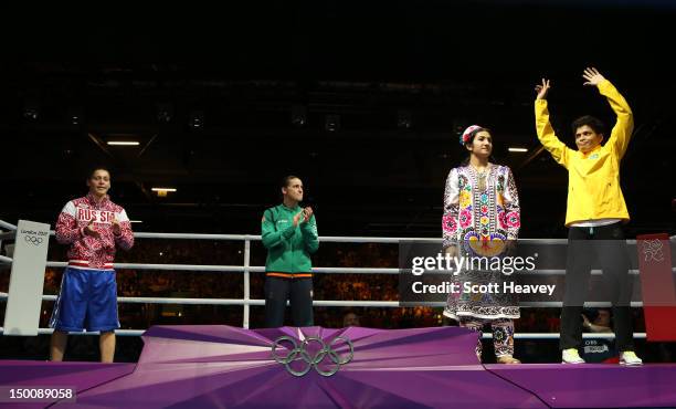 Silver medalist Sofya Ochigava of Russia, Gold medalist Katie Taylor of Ireland, Bronze medalist Mavzuna Chorieva of Tajikistan and Bronze medalist...