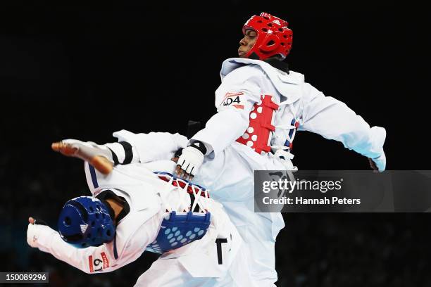 Lutalo Muhammad of Great Britain competes against Farkhod Negmatov of Tajikistan during the Men's -80kg Taekwondo Preliminary Round on Day 14 of the...