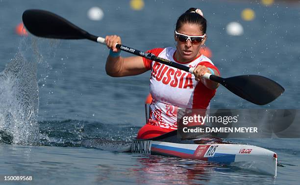 Russia's Natalia Lobova competes in the kayak single 200m women's heats during the London 2012 Olympic Games, at Eton Dorney Rowing Centre in Eton,...