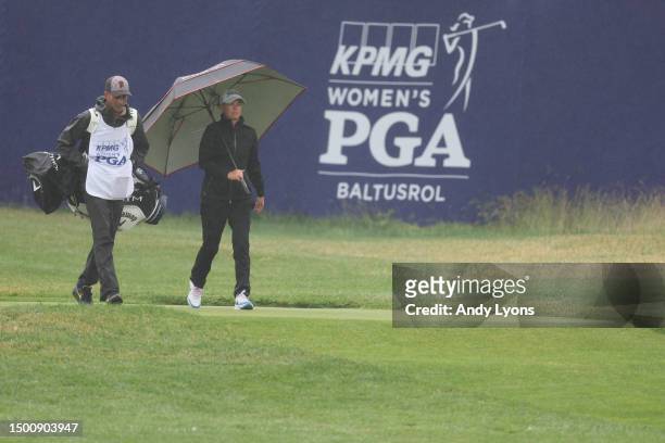 Lee-Anne Pace of South Africa and her caddie walk the 16th fairway during the second round of the KPMG Women's PGA Championship at Baltusrol Golf...