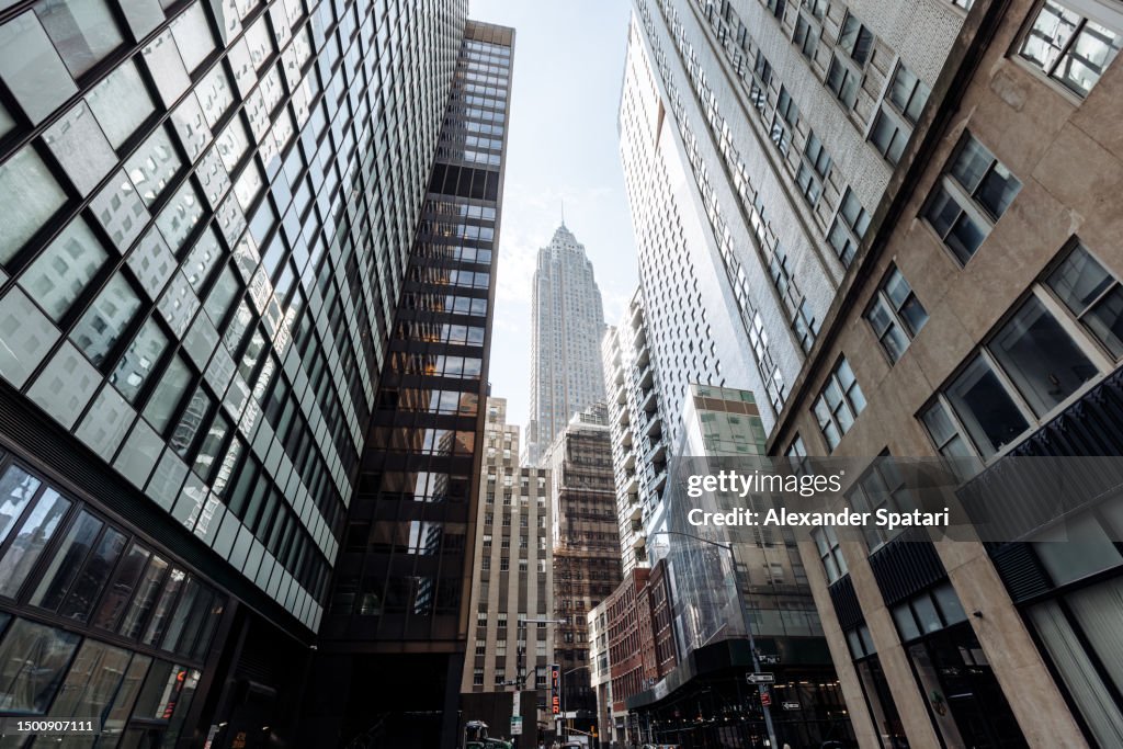 Low angle view of skyscrapers in Manhattan Downtown financial district, New York City, USA