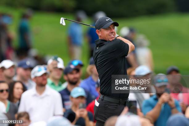 Rory McIlroy of Northern Ireland plays his shot from the fifth tee during the second round of the Travelers Championship at TPC River Highlands on...