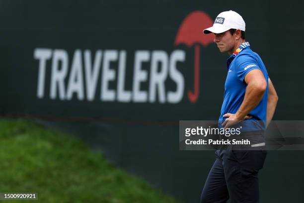 Viktor Hovland of Norway waits on the ninth green during the second round of the Travelers Championship at TPC River Highlands on June 23, 2023 in...