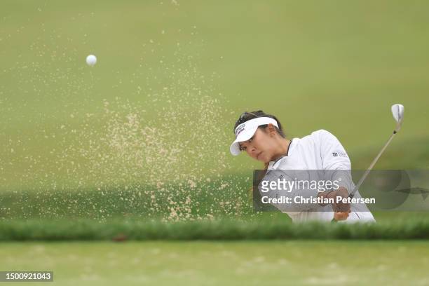 Alison Lee of the United States plays a shot from a bunker on the 17th hole during the second round of the KPMG Women's PGA Championship at Baltusrol...