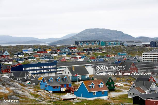 view over houses and the frelsers kirke (our saviour church) in the kolonihavn, nuuk, greenland - nuuk greenland stock pictures, royalty-free photos & images