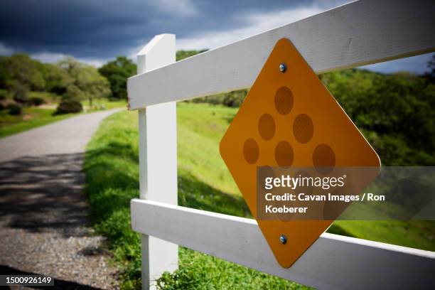 reflective caution sign - koeberer stock pictures, royalty-free photos & images
