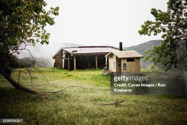 a restroom and a old building in the backcountry of henry w. coe state park - koeberer stock pictures, royalty-free photos & images