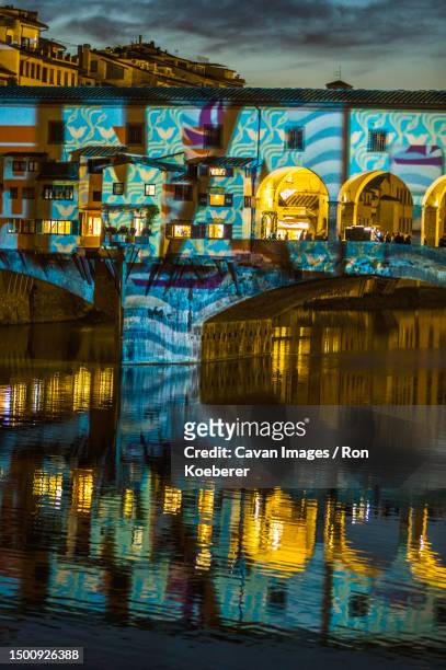 light show projected on ponte vecchio, florence, tuscany, italy - koeberer stock pictures, royalty-free photos & images