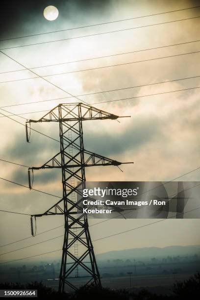 metal electrical tower - koeberer stock pictures, royalty-free photos & images