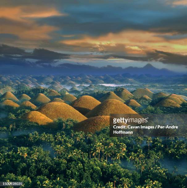 sunrise - chocolate hills - bohol philippines stock pictures, royalty-free photos & images