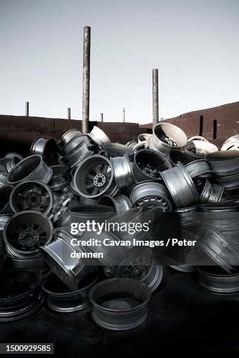 Pile of wheel rims at a recycling facility, Maine