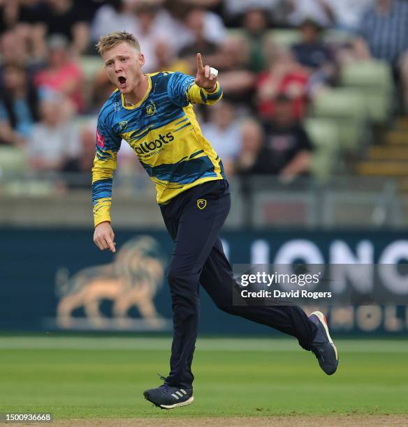 Dan Mousley of Birmingham Bears celebrates after taking the wicket of Brett D'Oliveira during the Vitality Blast T20 match between Birmingham Bears...