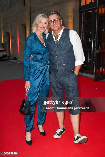 Hans Sigl and Susanne Sigl attend the opening of the Munich Film Festival 2023 at Gasteig on June 23, 2023 in Munich, Germany.