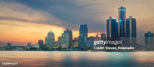 detroit, michigan - skyline at dusk - detroit michigan stock pictures, royalty-free photos & images