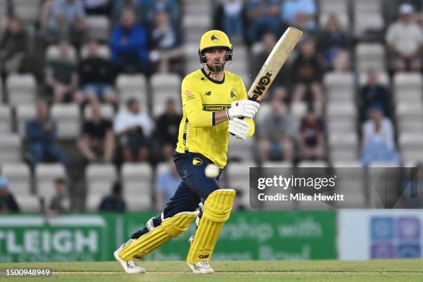 James Vince of Hampshire hits a boundary during the Vitality Blast T20 between Hampshire Hawks and Essex Eagles at Ageas Bowl on June 23, 2023 in...