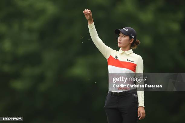 Chella Choi of South Korea tests the wind on the eighth tee during the second round of the KPMG Women's PGA Championship at Baltusrol Golf Club on...