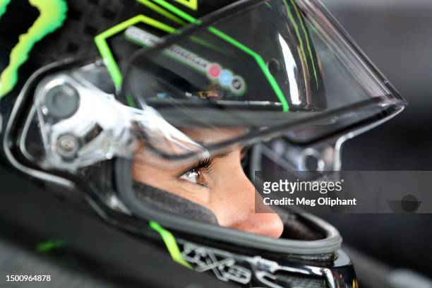 Hailie Deegan, driver of the Ford Performance Ford, sits in her truck during qualifying for the NASCAR Craftsman Truck Series Rackley Roofing 200 at...