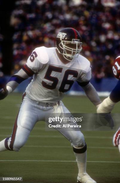 Linebacker Lawrence Taylor of the New York Giants rushes the line in the game between the New York Giants vs the New England Patriots at Foxboro...