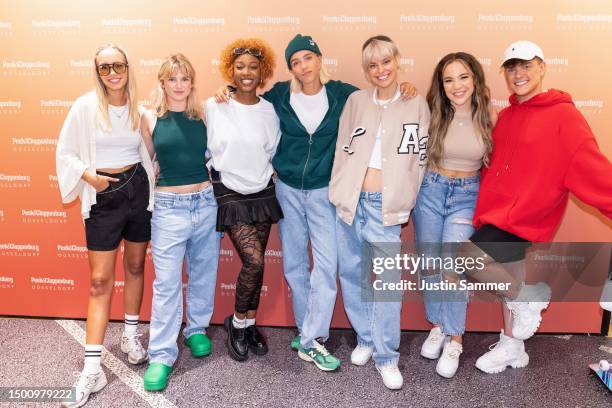 Lisa Mantler, Sinje Irslinger, Jobel Mokonzi, Lena Mantler, Selma May, Alisha and Tim Kampmann attend the launch event for the new "Get Up" Movie...