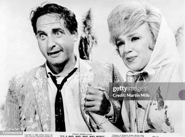 In this United Artist handout, American comedian Sid Caesar and American comedienne, actress, singer and businesswoman Edie Adams pose on the set of...