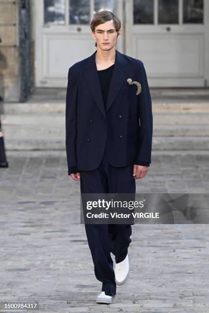 Model walks the runway during the Officine Generale Ready to Wear Spring/Summer 2024 fashion show as part of the Paris Men Fashion Week on June 23,...