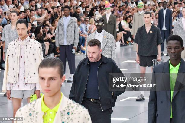 Kim Jones walks the runway during the Dior Ready to Wear Spring/Summer 2024 fashion show as part of the Paris Men Fashion Week on June 23, 2023 in...