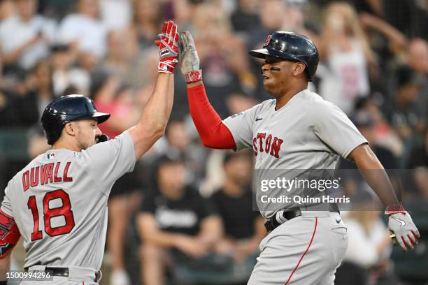 Jason Varitek and Adam Duvall of the Boston Red Sox celebrate after hitting a two-run home run in the fourth inning against the Chicago White Sox at...