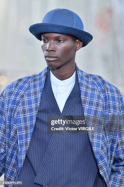 Model walks the runway during the Kenzo Ready to Wear Spring/Summer 2024 fashion show as part of the Paris Men Fashion Week on June 23, 2023 in...