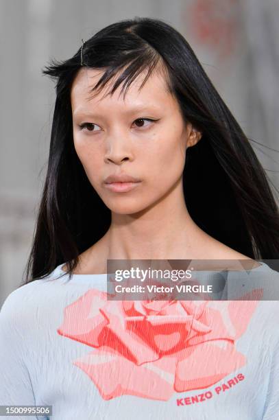 Model walks the runway during the Kenzo Ready to Wear Spring/Summer 2024 fashion show as part of the Paris Men Fashion Week on June 23, 2023 in...