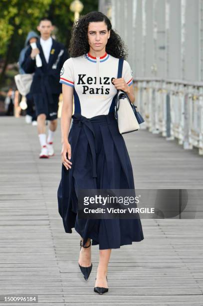 Model walks the runway during the Kenzo Ready to Wear Spring/Summer 2024 fashion show as part of the Paris Men Fashion Week on June 23, 2023 in...