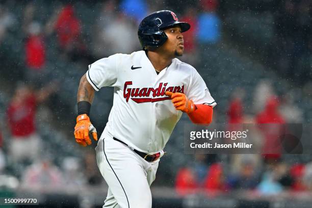 Jose Ramirez of the Cleveland Guardians rounds the bases after hitting a solo home run during the seventh inning against the Milwaukee Brewers at...