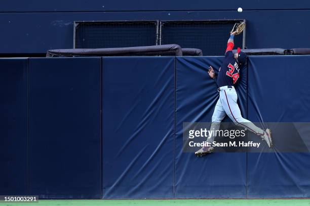 Derek Hill of the Washington Nationals is unable to catch a a solo homerun hit by Ha-Seong Kim of the San Diego Padres during the first inning of a...