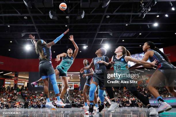 Betnijah Laney of the New York Liberty shoots against Rhyne Howard of the Atlanta Dream during the second half at Gateway Center Arena on June 23,...